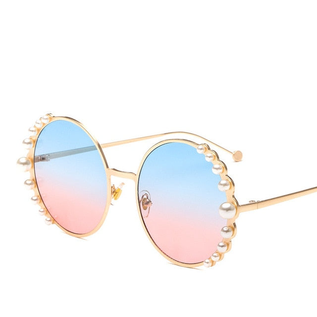 Calanovella Round Sunglasses Stylish Pearl Round Sunglasses for Men Women 2020 Elegant Oval Vintage Pearl Sunglasses Round Eighties Retro Sunglasses UV400 gray,brown,purple,blue,pink,blue pink,champagne,black 39.99 USD