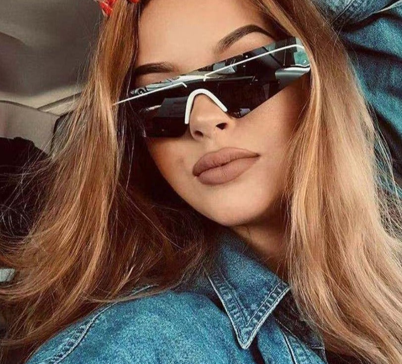 Calanovella Men Women Sunglasses Cool Vintage Semi-Two Toned Rimless Sunglasses for Men Women Trendy Eighties Retro New Stylish Men Women’s Sun Glasses UV400 black,pink,silver,red 34.99 USD