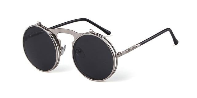 Calanovella Steampunk Round Sunglasses Cool Oval Round Flip Up Sunglasses for Men Women 2020 Steampunk Goggles Flipup Lenses Trendy Men’s Women’s Gothic Metal Frame Oval Round Clip on Sun Glasses UV400 black gray,gold gray,silver gray,silver,silver blue,silver green,rose gold gray 34.99 USD