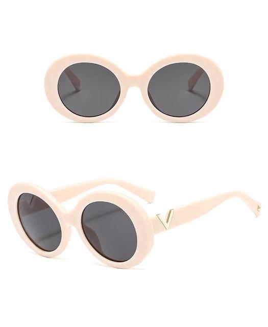 Calanovella Round Sunglasses Stylish New Round Oval Sunglasses for Men Women 2020 Cool 90s Style Retro Frame Sun Glasses black,champagne,brown,white gray,champagne gray 34.99 USD