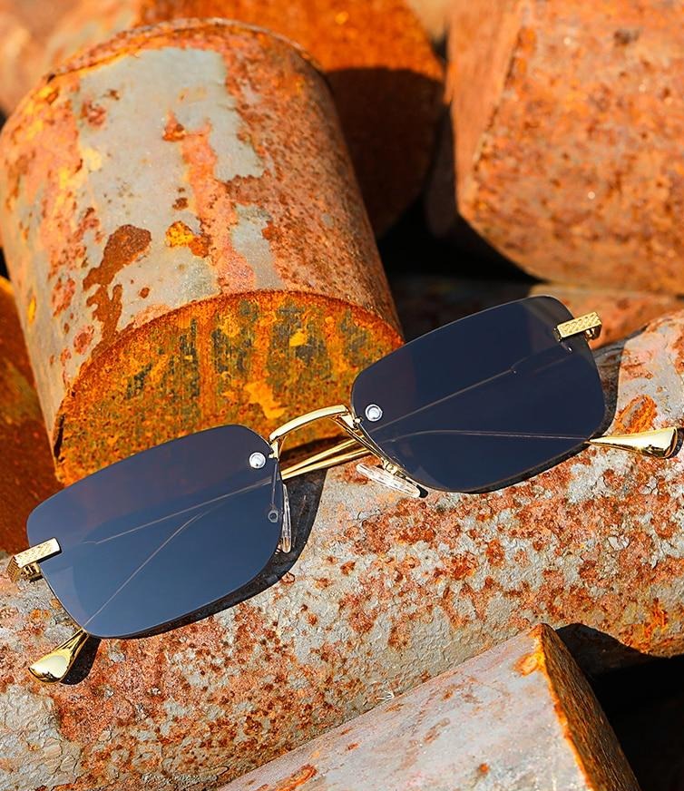 Calanovella Fashion Rimless Rectangle Sunglasses Cool Shades UV400
